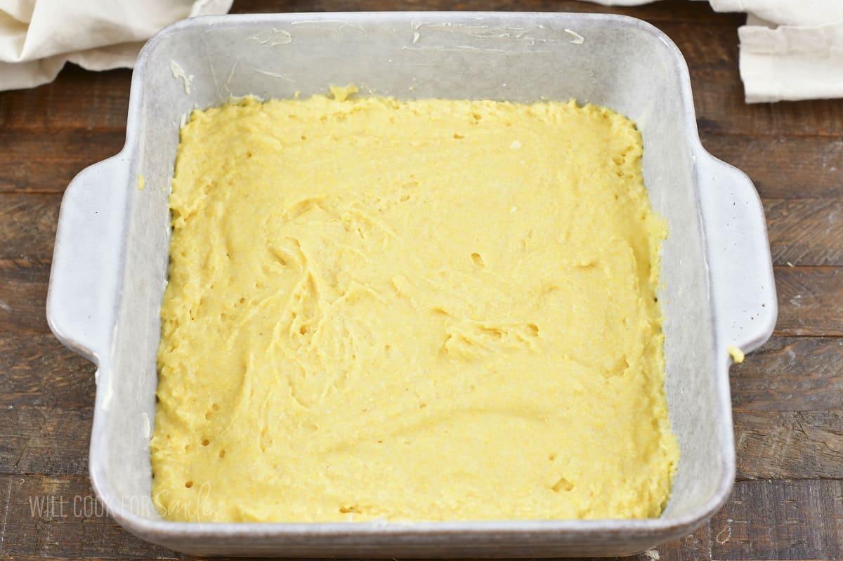 cornbread batter spread in baking dish.