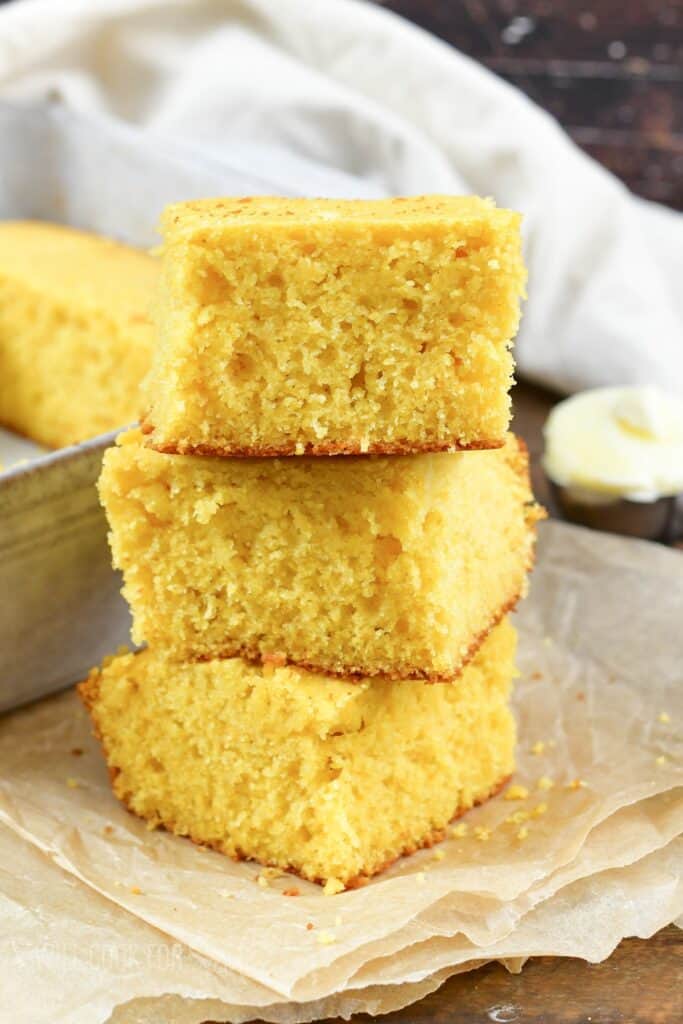 three cornbread squares stacked together.