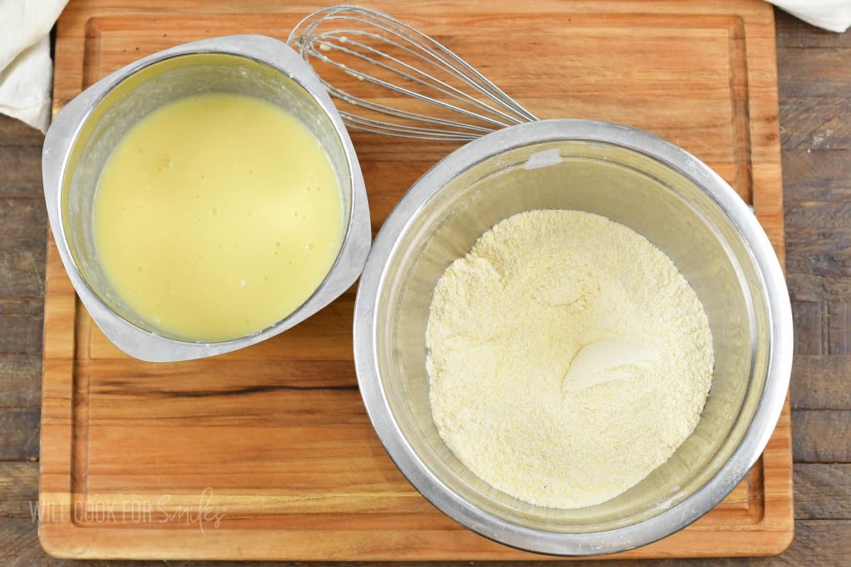 dry and wet ingredients mixed in different bowls.