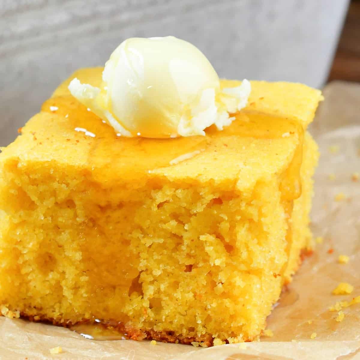 https://www.willcookforsmiles.com/wp-content/uploads/2022/11/Buttermilk-Cornbread-with-butter-and-honey-square.jpg