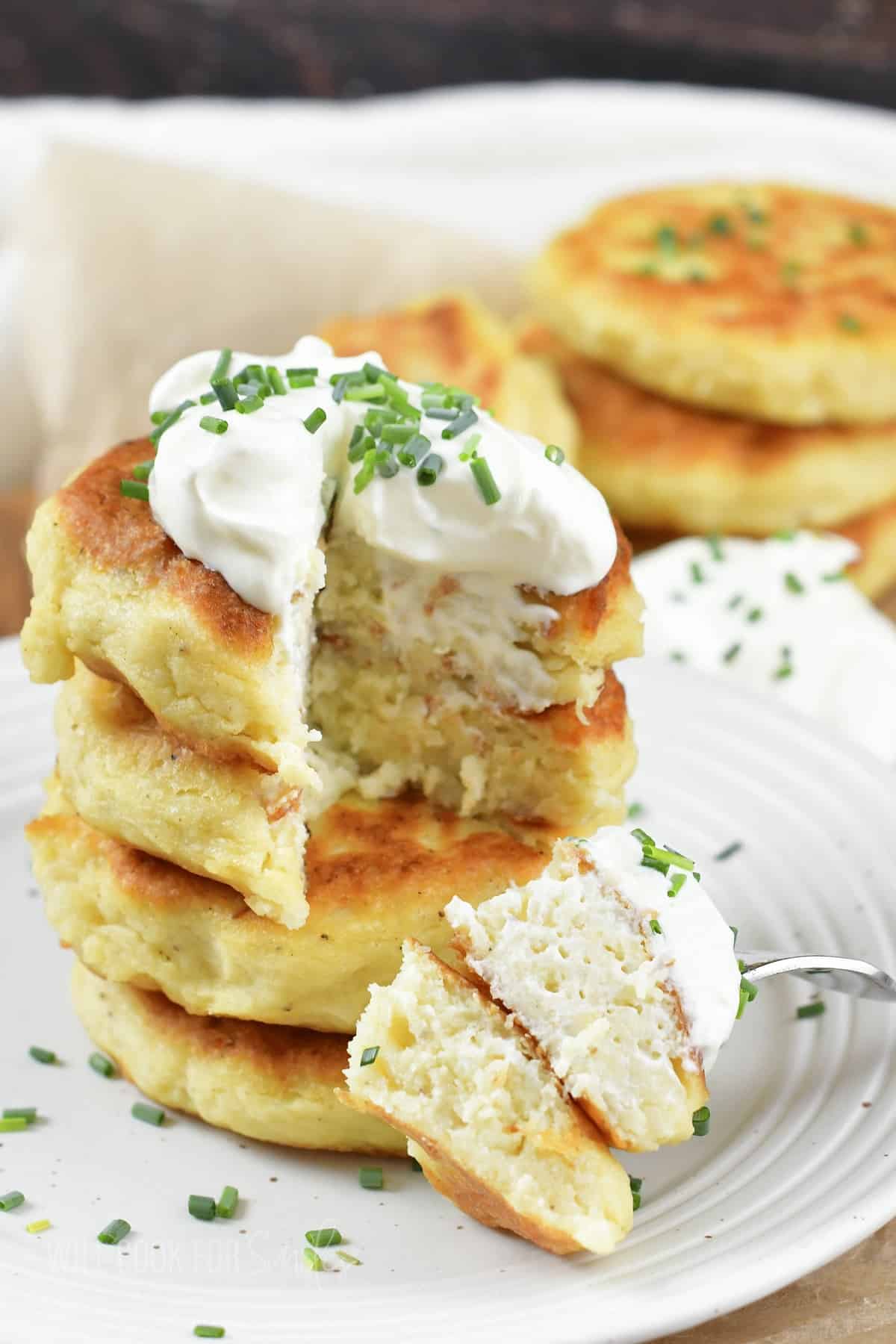 stacked mashed potato cakes and two cut out.
