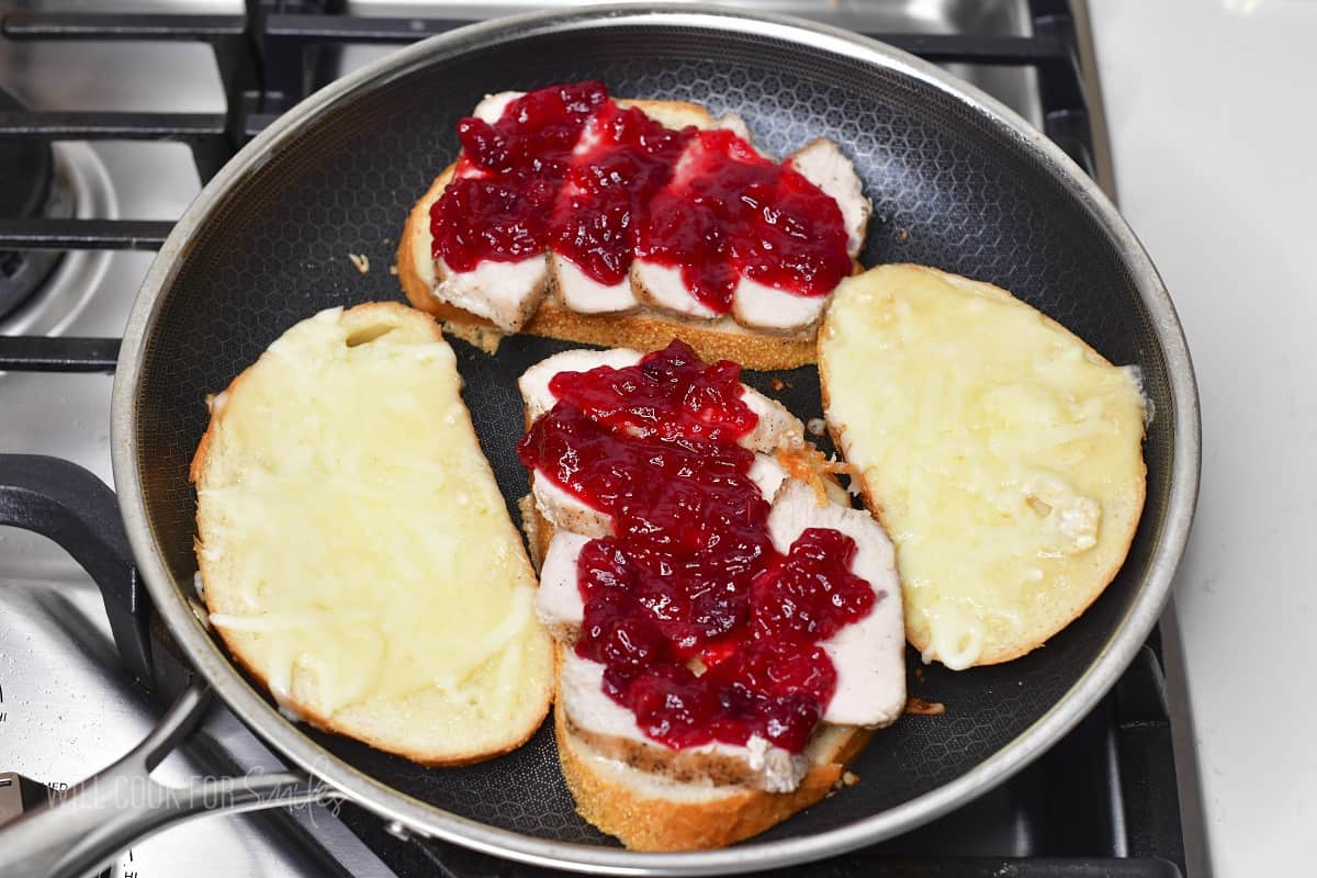 four slices with brie and two with turkey and cranberry.