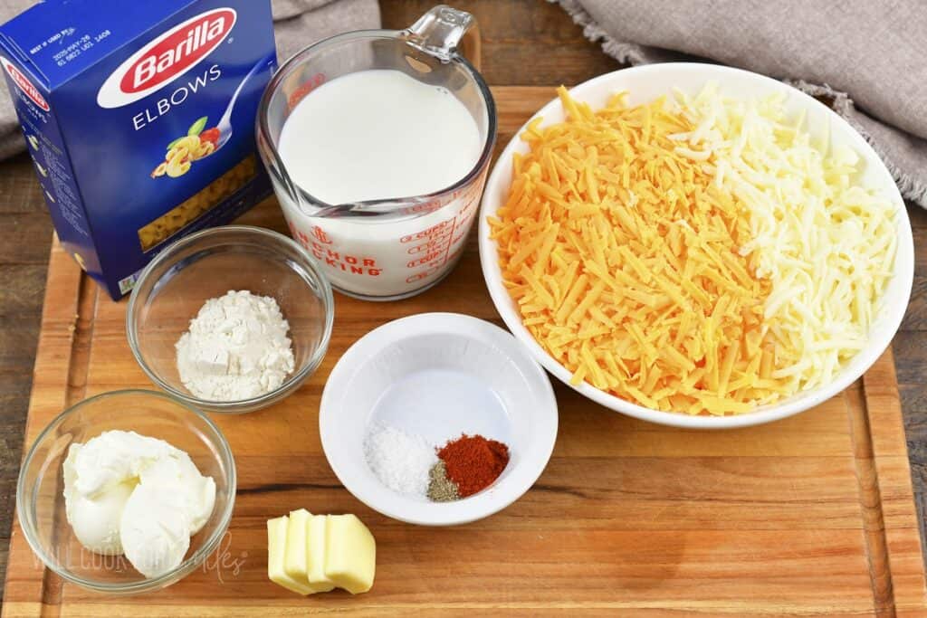 ingredients for homemade mac and cheese on a board.