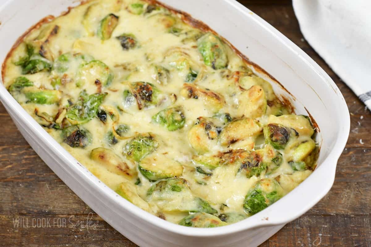 baked creamy brussels sprouts in a baking dish.