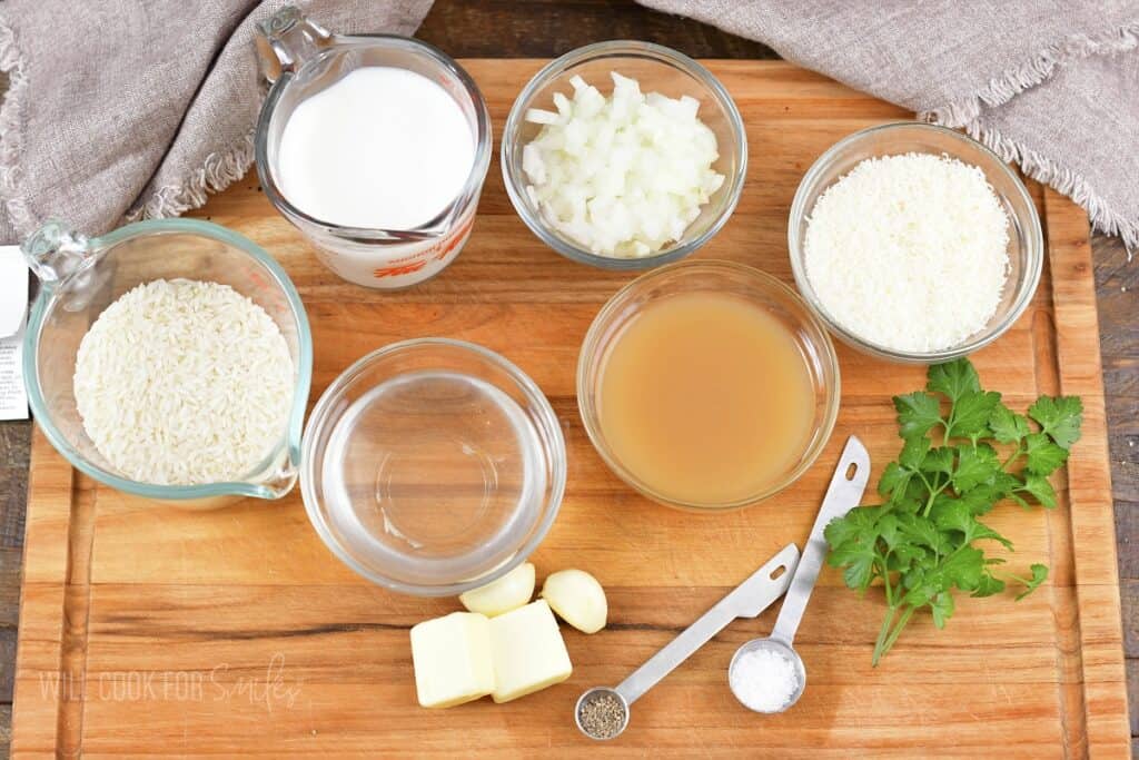 ingredients for parmesan rice on a wooden board.