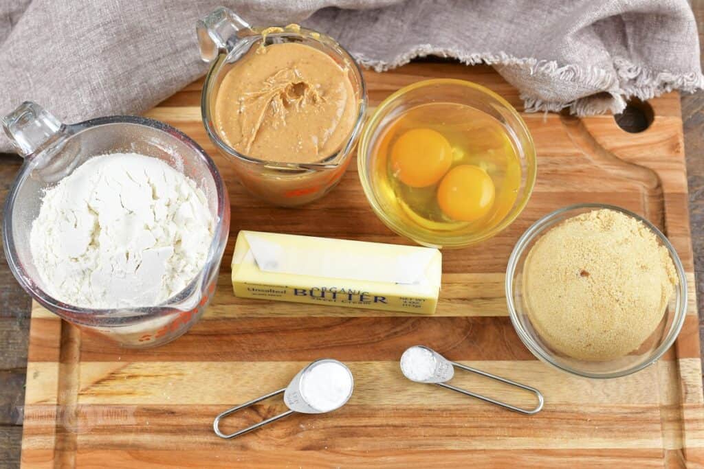 ingredients for the peanut butter cookies on the board.