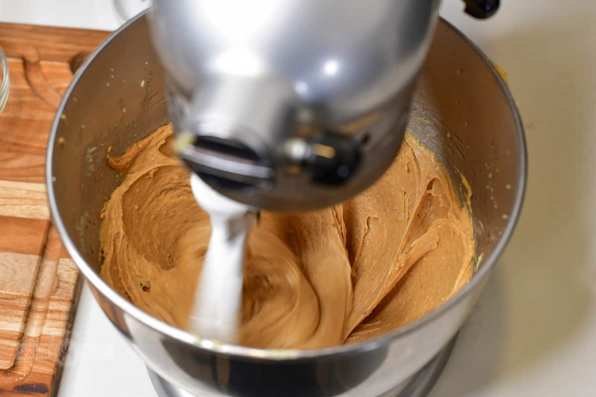 mixing the cookie dough in the stand up mixer.