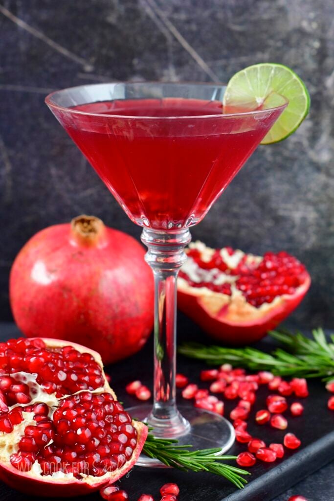 side view of the pomegranate martini in a tall glass.