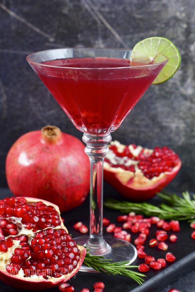 side view of the pomegranate martini in a tall glass.