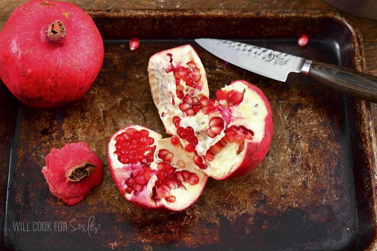 pomegranate cut into several pieces.