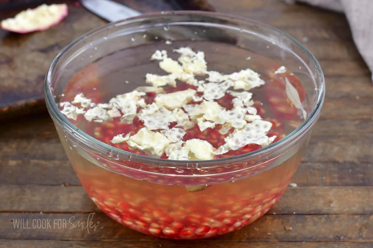 separated pomegranate seeds from the membrane in water.