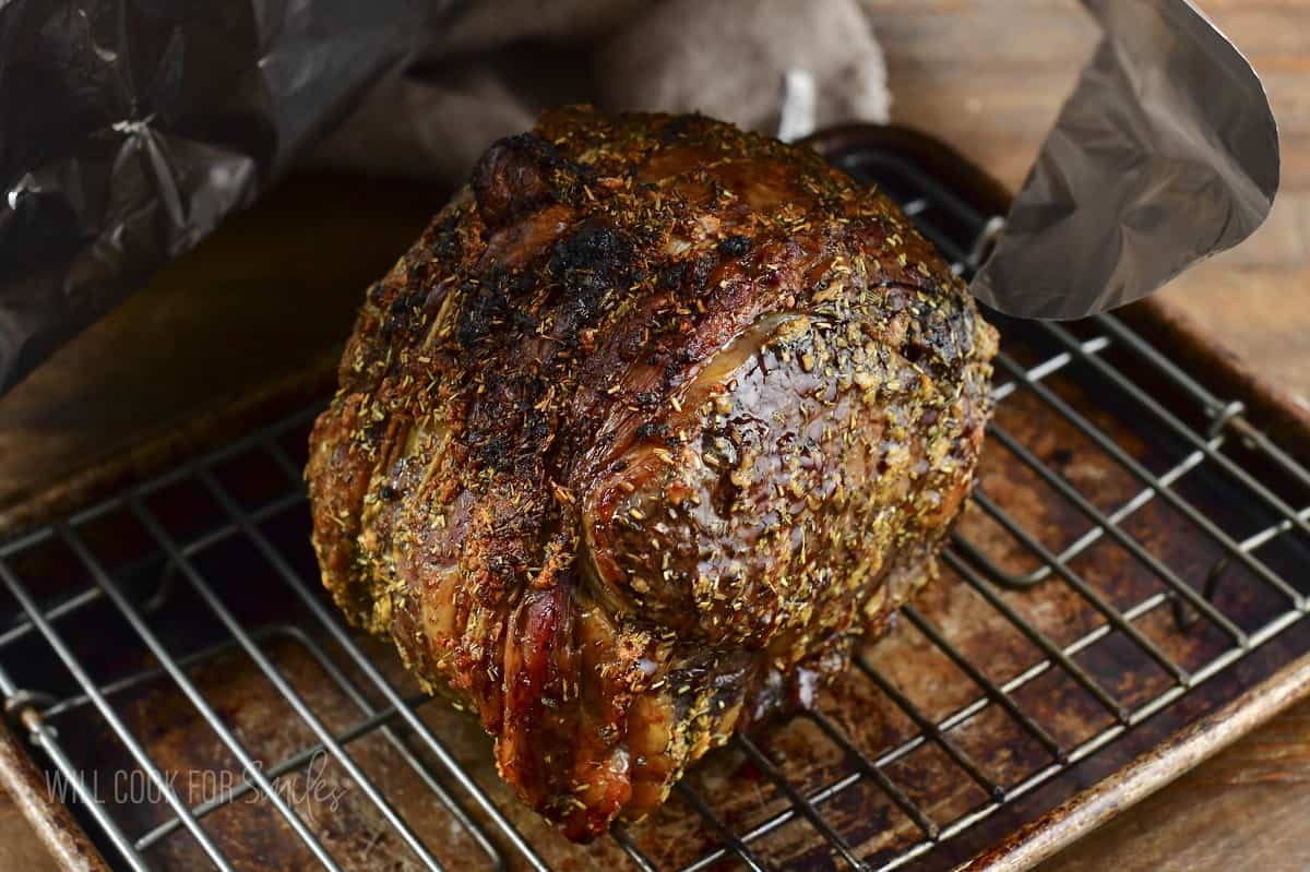 roasted prime rib resting on the wire rack.