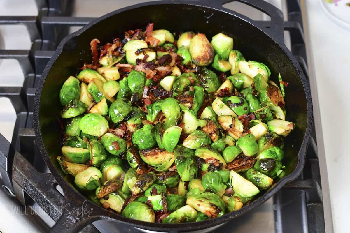 cooked brussels, bacon, and shallots in a skillet.