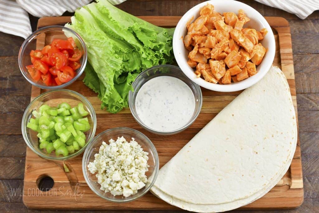 ingredients for the buffalo chicken wrap in the board.