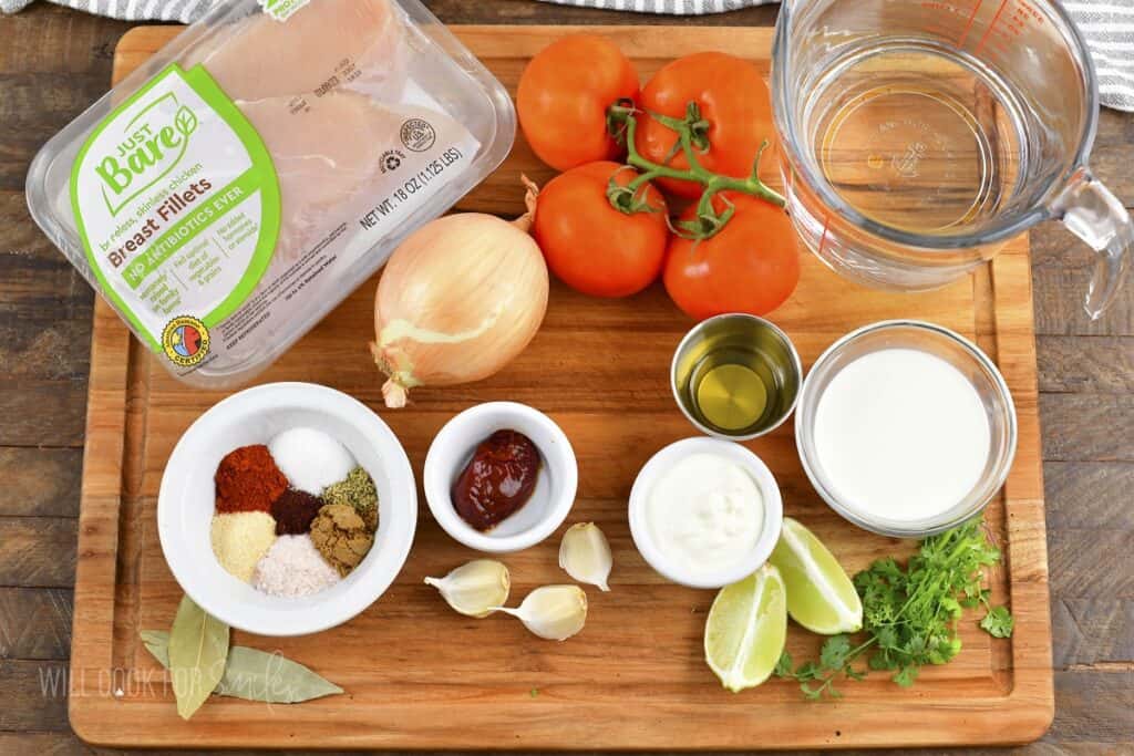 ingredients for enchilada soup in the cutting board.