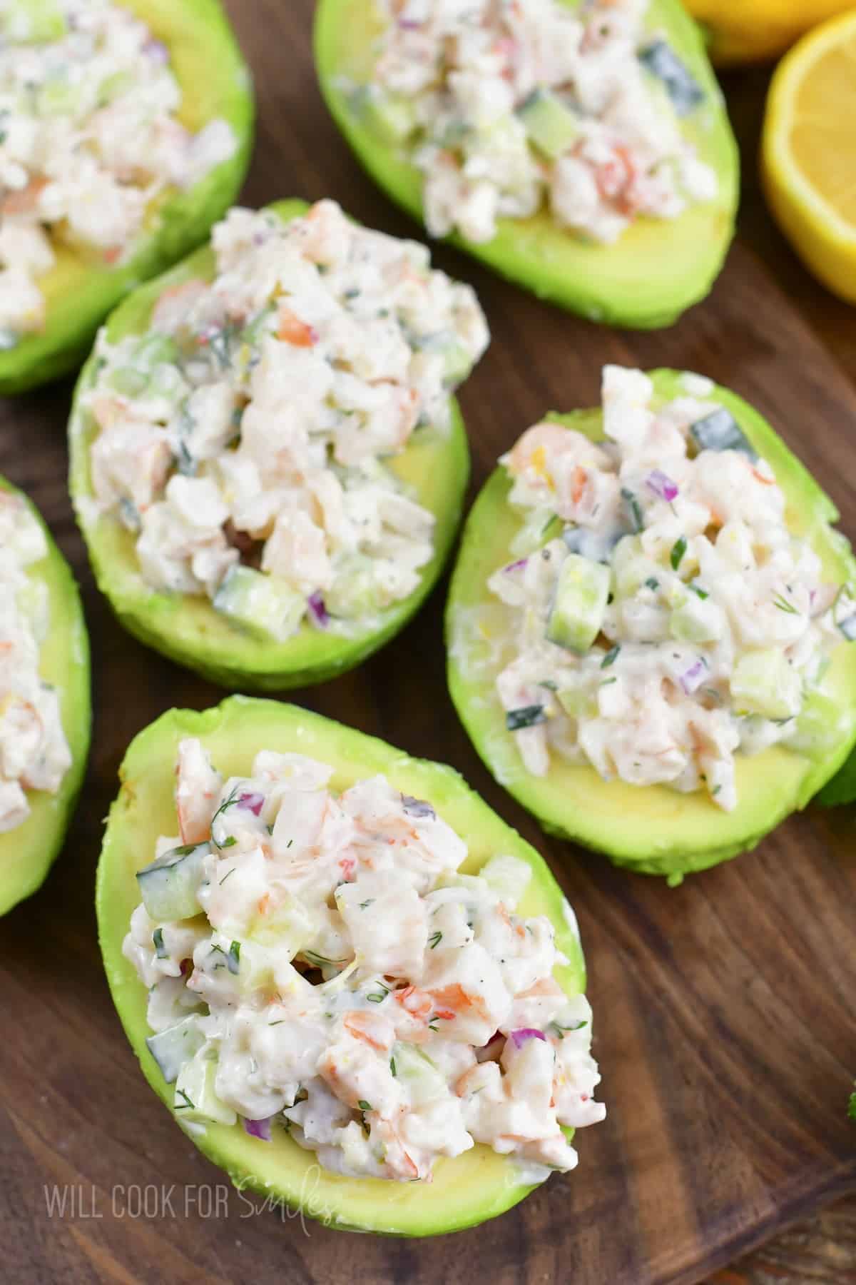 top view of several shrimp salad stuffed avocados.