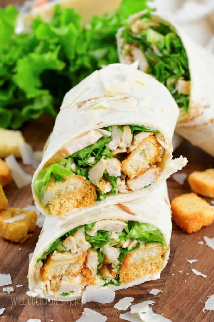 two chicken caesar wraps stacked on top of each other.