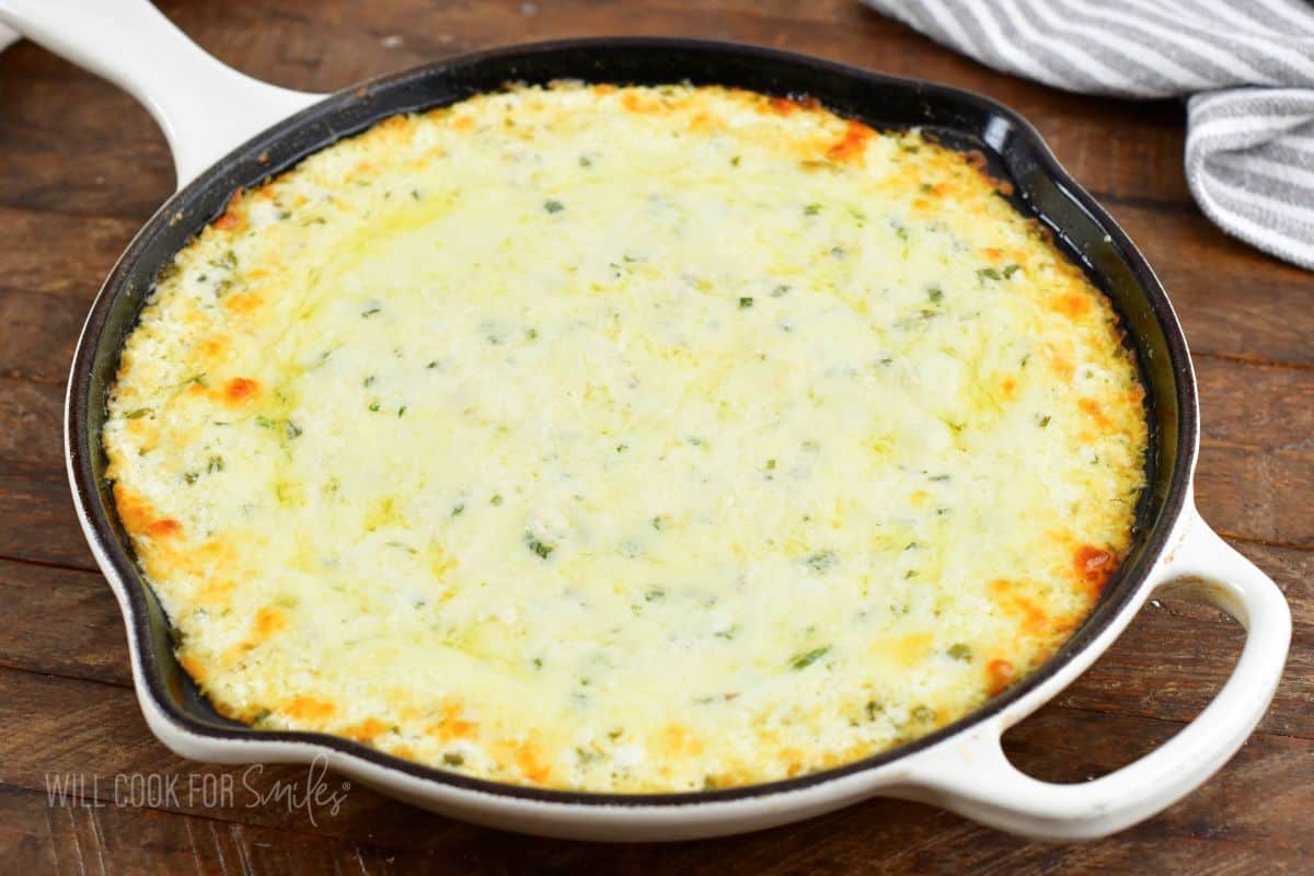 baked four cheese dip in a skillet.