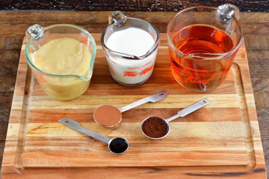 ingredients for the homemade Irish cream on the board.