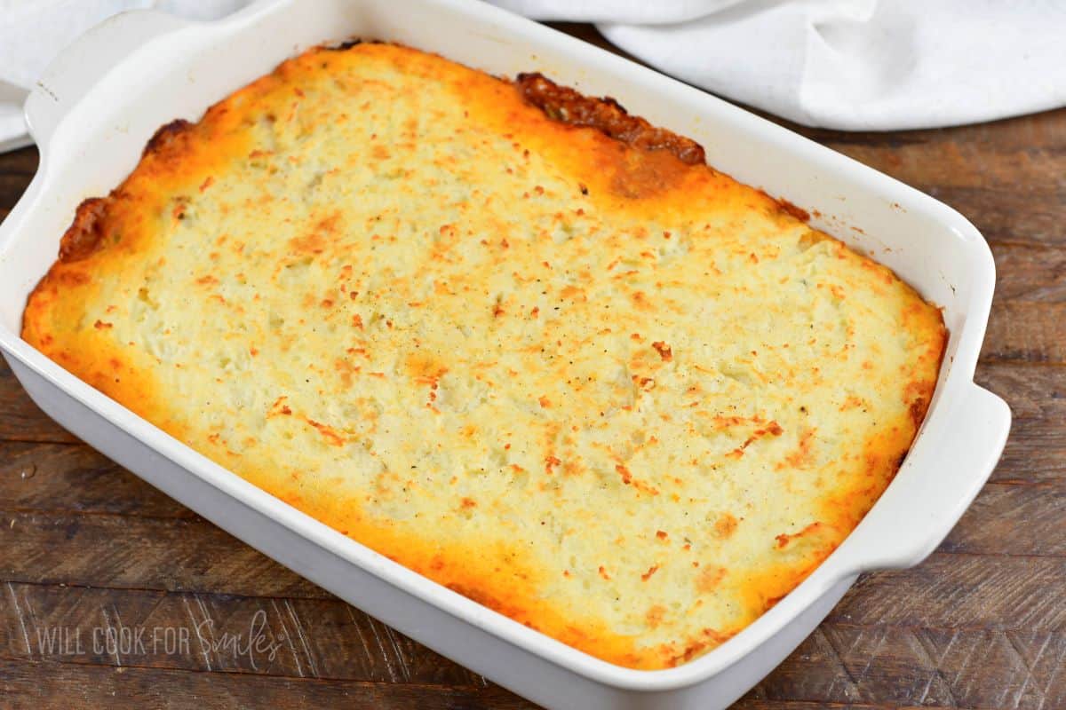 baked shepherd's pie in a white casserole dish.