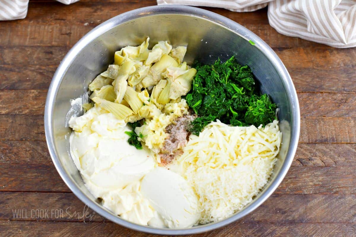 ingredients for the spinach dip in the mixing bowl.