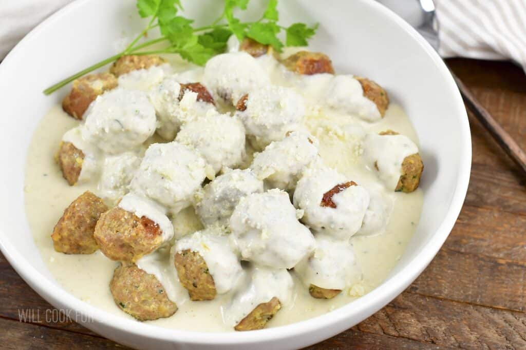 closeup creamy parmesan turkey meatballs in the bowl.