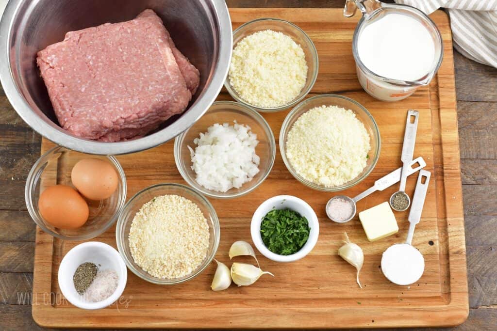 ingredients for turkey meatballs in parmesan sauce on the board.