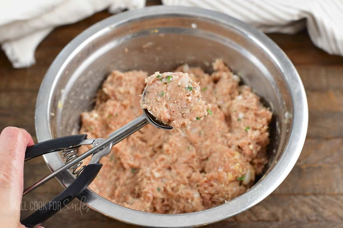 turkey meatball mixture in a scoop.