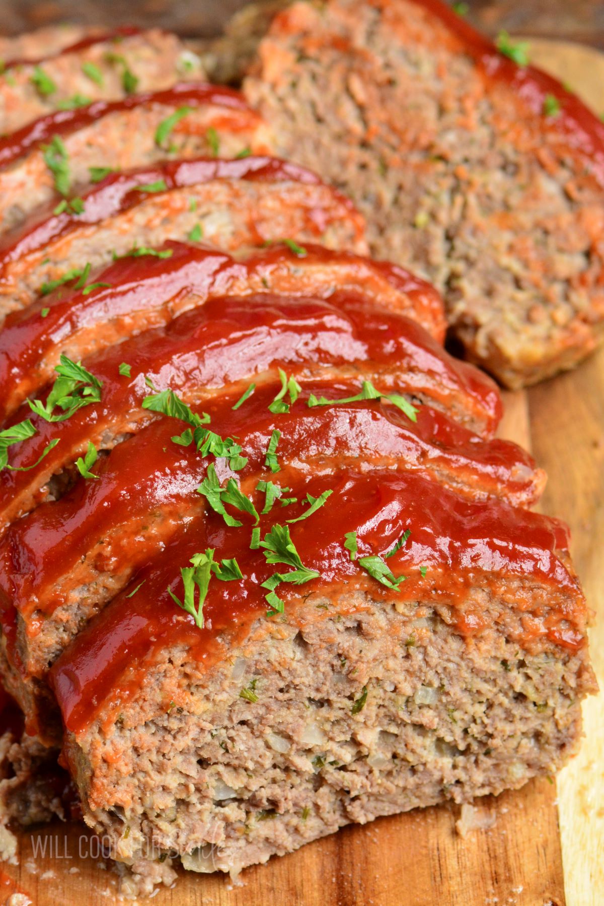 front view of sliced meatloaf on the cutting board.