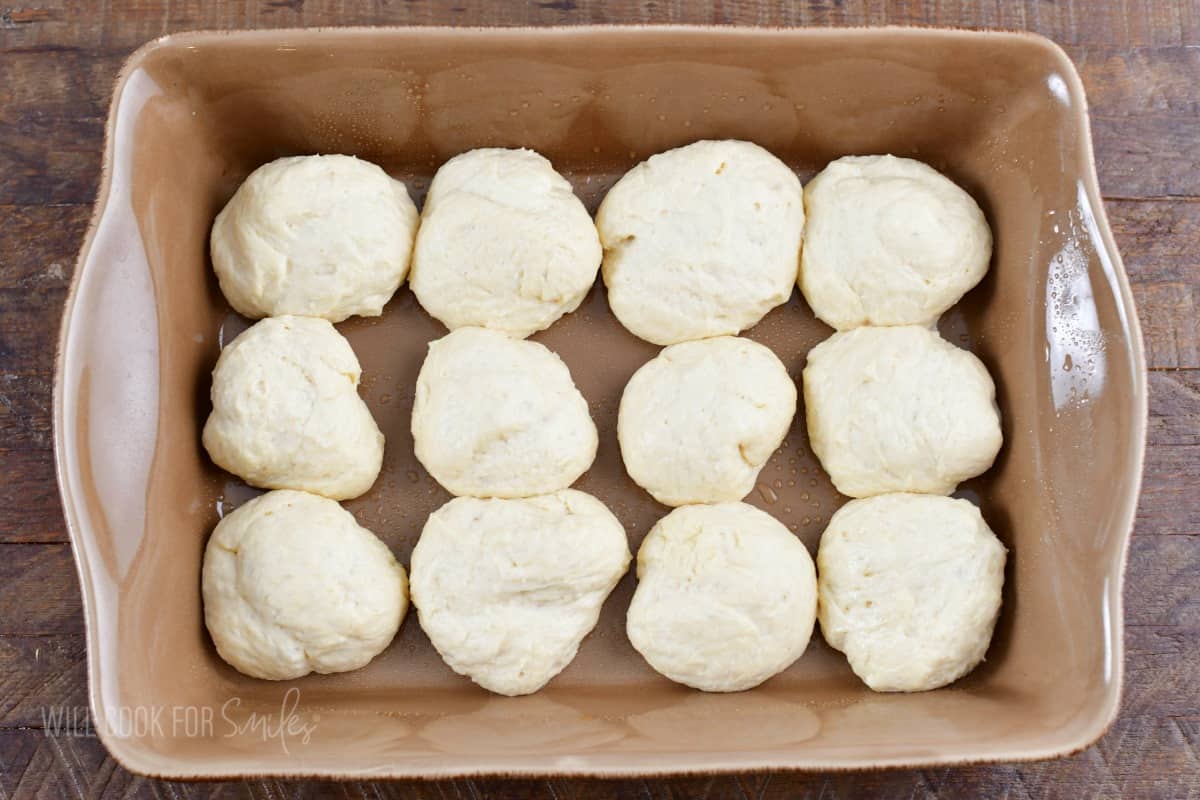 raised twelve pieces of dough in the baking dish.