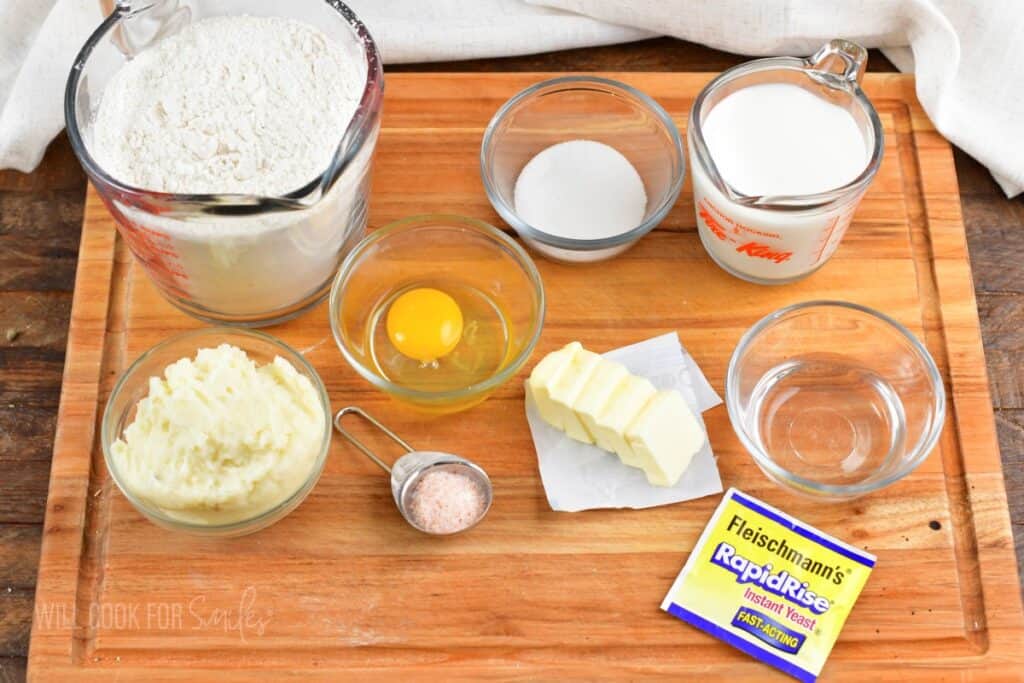 ingredients for potato rolls on the cutting board.