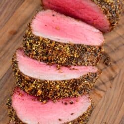 sliced beef tenderloin coated in peppercorn seasoning.