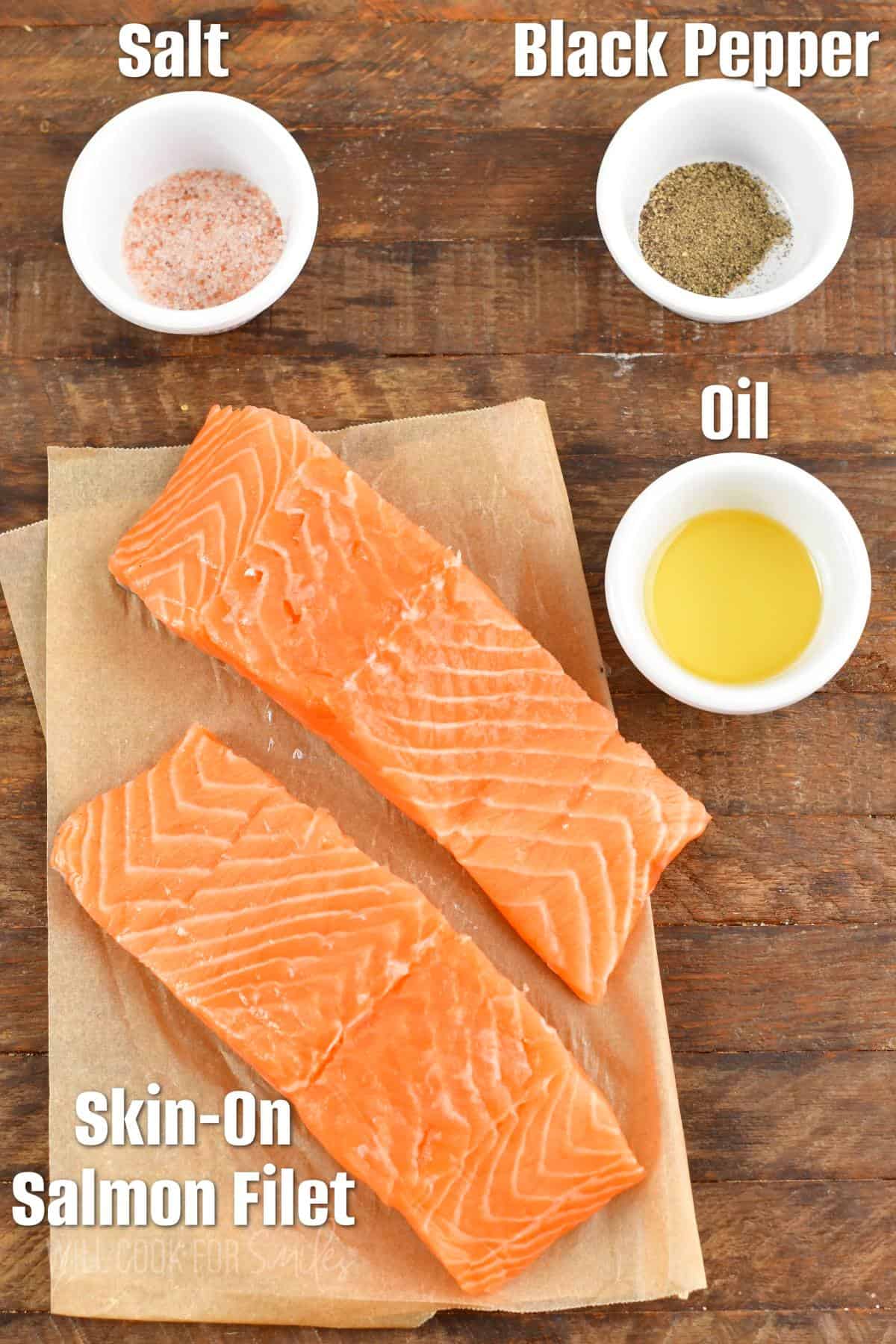 labeled ingredients to make crispy skin salmon on wooden board.