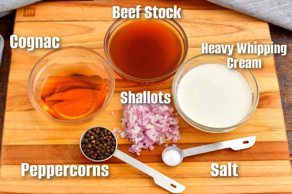 labeled ingredients to make peppercorn sauce on cutting board.