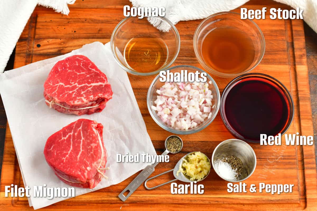 labeled ingredients to make red wine steak sauce on the cutting board.