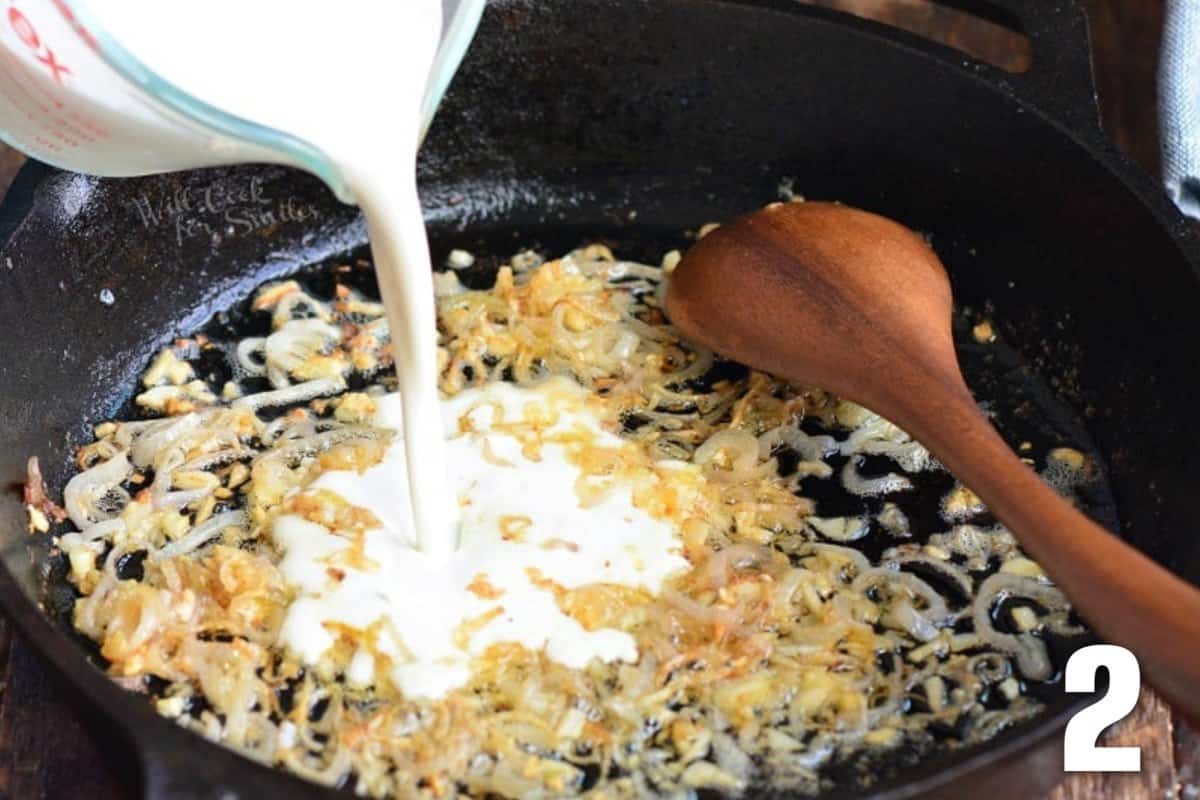 adding heavy whipping cream to sauteed shallots and garlic.