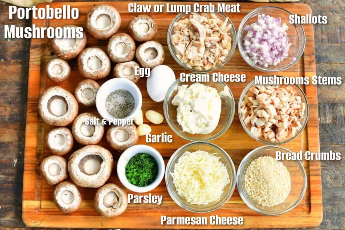 The ingredients for crab stuffed mushrooms are placed on a cutting board.