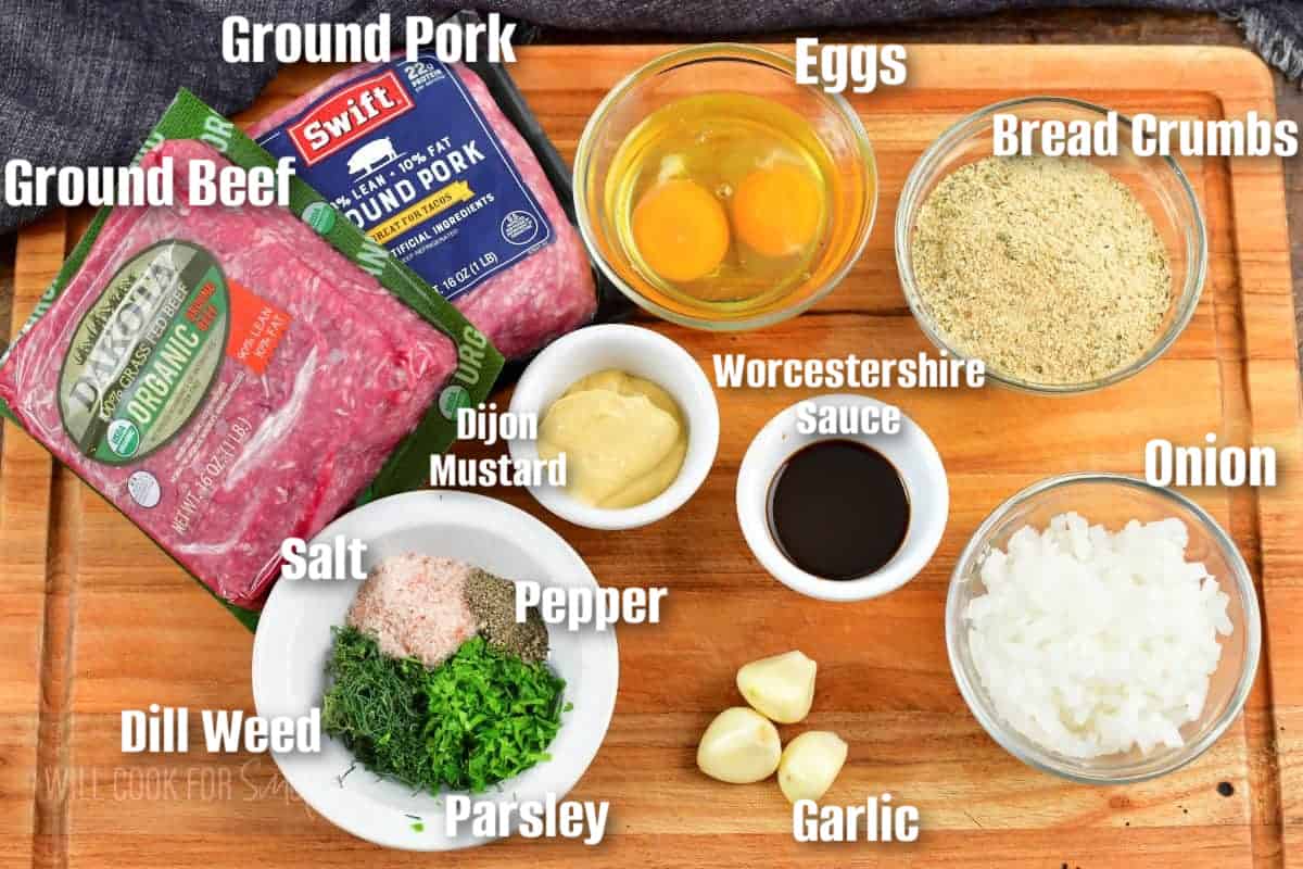 labeled ingredients to make meatloaf on the cutting board.