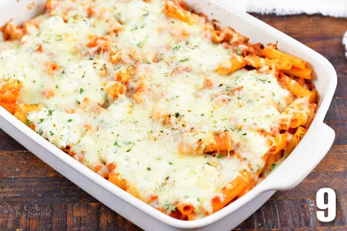 baked ziti in the white casserole dish after baking.