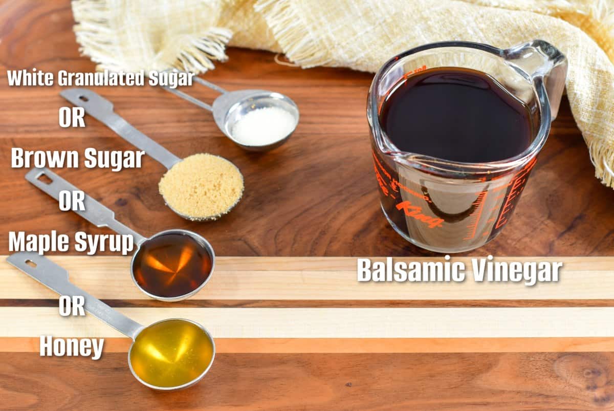 ingredients to make balsamic glaze on the wood cutting board.