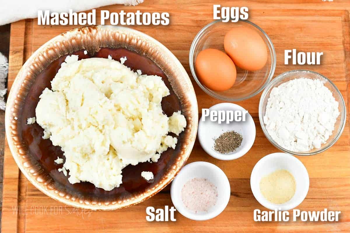 labeled ingredients to make mashed potato cakes on a cutting board.