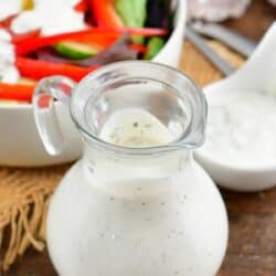 creamy buttermilk ranch dressing in a glass dressing jar.