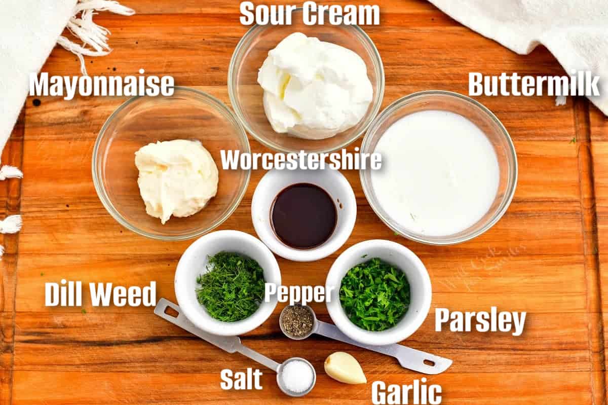 labeled ingredients to make buttermilk ranch on a cutting boars.