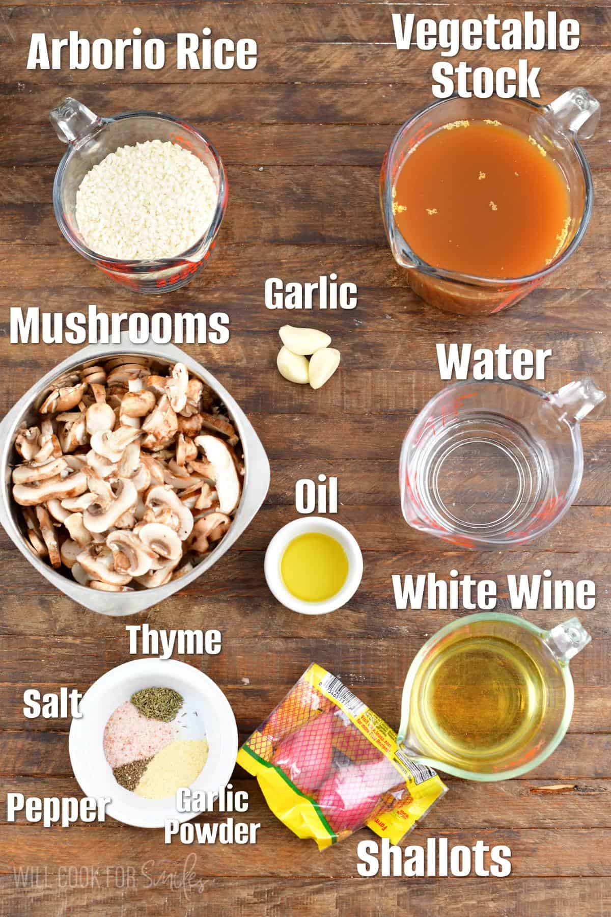 Labeled ingredients to make mushroom risotto on wooden background.