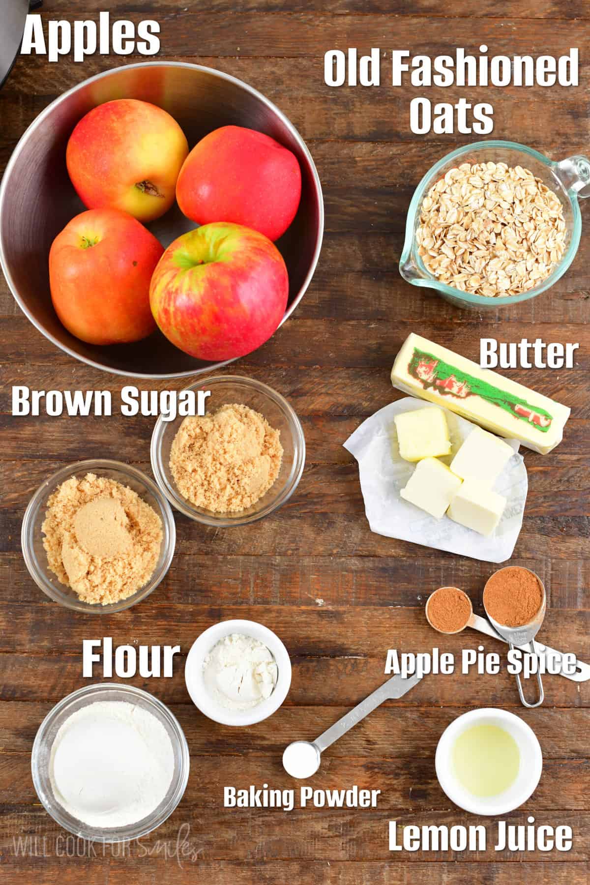 labeled ingredients for apple crisp on a wood surface.