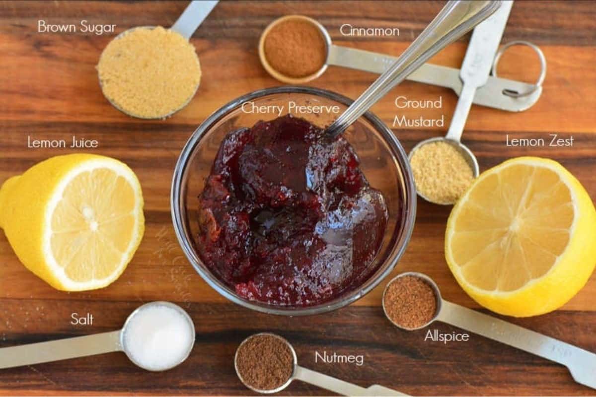 Labeled ingredients for baked ham cherry glaze on a cutting board.