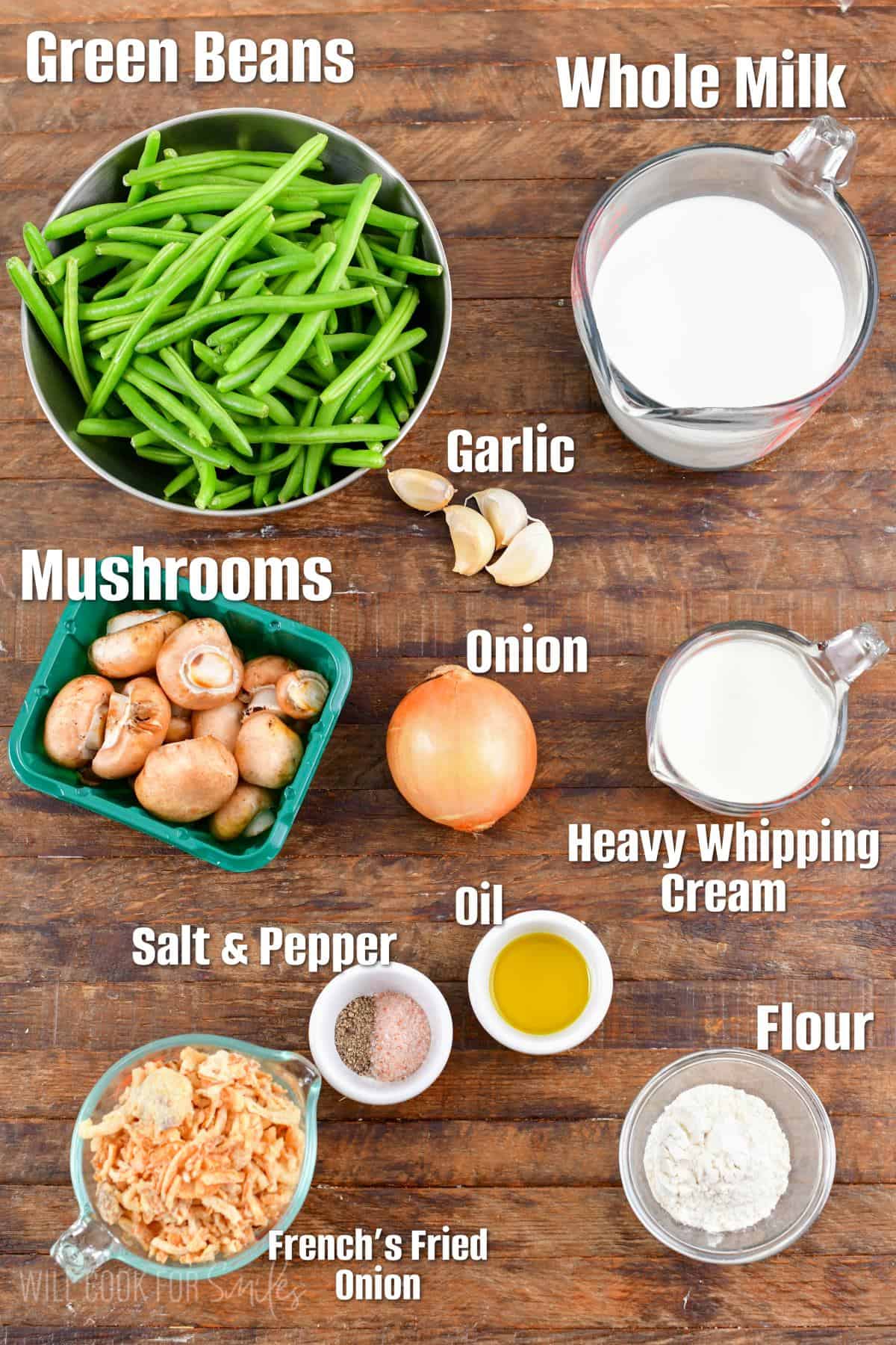 labeled ingredients for green bean casserole on a wood surface.