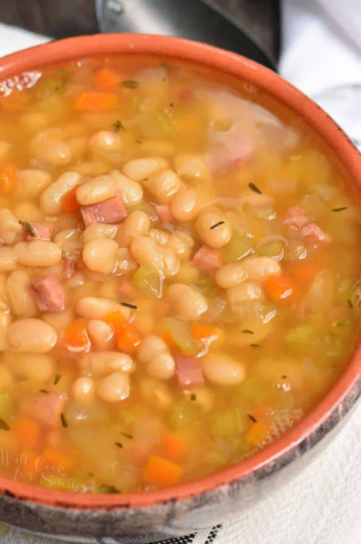 a bowl of ham and bean soup.