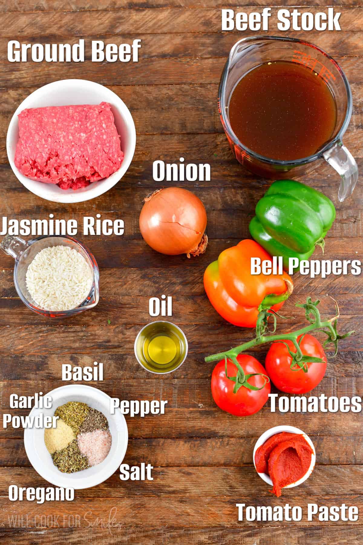 ingredients for stuffed bell pepper soup on a wood cutting board.