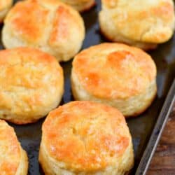 honey butter biscuits on a baking sheet.